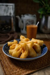 Thai style breakfast set , morning breakfast,chinese donut, youtiao, chinese breadstick	with hot tea