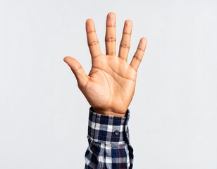 Hand raised, showing five fingers