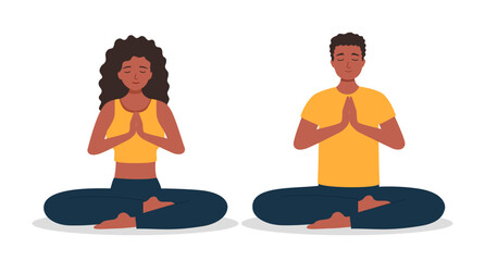 Man and woman sitting yoga pose lotus. Couple sitting cross-legged meditating on a white background. Concept of yoga, meditation, healthy body, and relaxation.