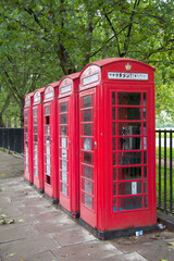 A row of red phone booths in London