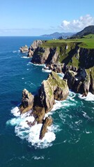 Coastal cliffs meet the sea