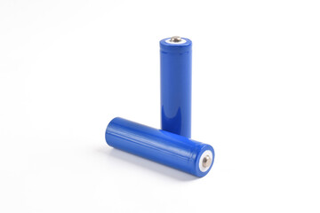 Two blue AA size batteries isolated on white backgraound