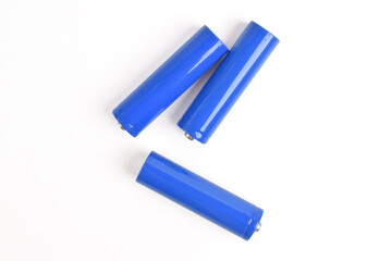 Blue metal AA-size batteries isolated on white background. Carbon zinc batteries, rechargeable...