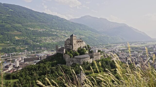 Val&egrave;re Castle in Sion Framed by Summer Grass &ndash; Aerial View, video taken on 30 June 2025