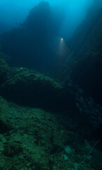 Underwater photograpy of mountain and dramatic landscape. From a scuba dive at Chumphon marine park in Thailand.