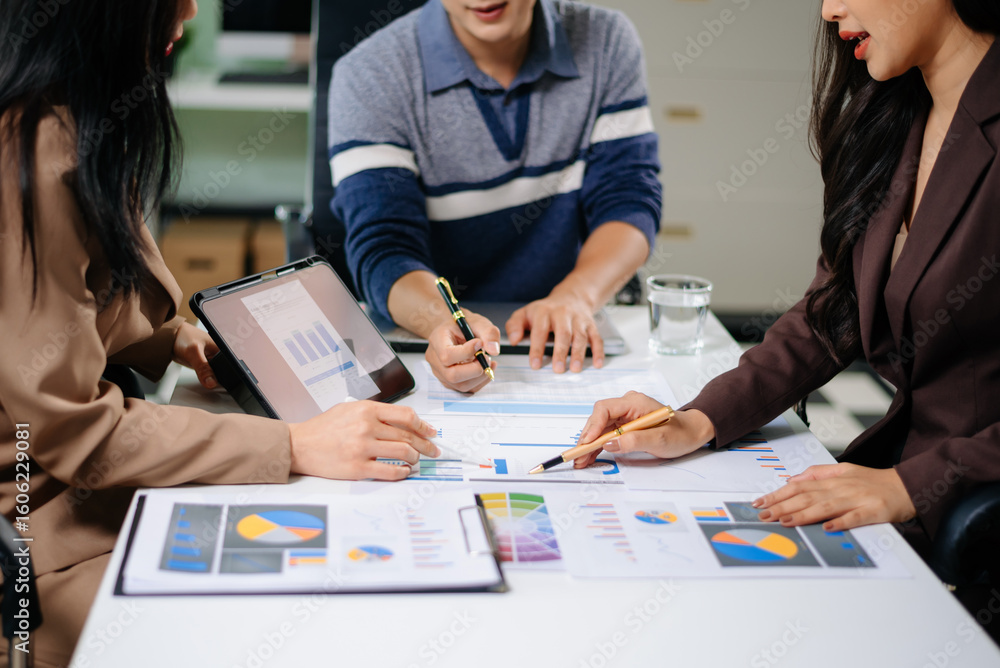 Poster business documents on office table with smart phone and calculator digital tablet and graph business
