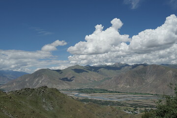 the village sits in the river valley on the tibetan plateau, the highest on earth