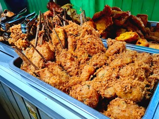Perkedel is made from fried potatoes and several other traditional Javanese foods, sold in a simple...