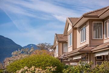 Top of luxury house with shingle roof and nice windows in Summer in Vancouver, Canada, North America. Day time on July 2025.