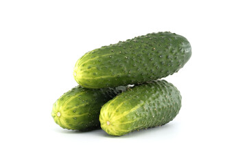 Stack of fresh, green cucumbers, ready for a healthy and delicious meal against white.
