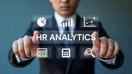 Businessman interacting with hr analytics interface displaying charts and data for human resources management