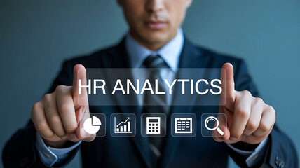Businessman interacting with a digital interface displaying hr analytics and various business icons