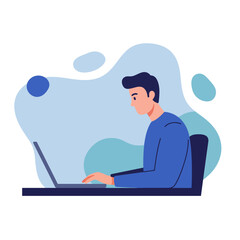 A young man sits at a desk, focused on typing and working on his laptop computer.