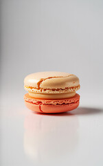 Photo of two macarons stacked on a white background