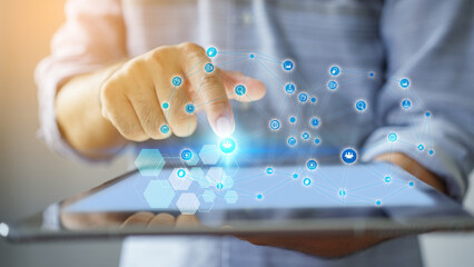 Person Using Tablet with Network Visualization