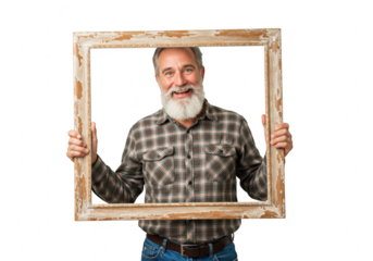 Smiling senior man with beard holding an antique wooden picture frame against a transparent background