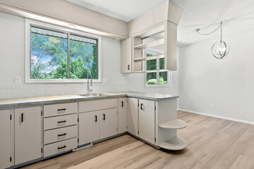 Kitchen with a sink and a window