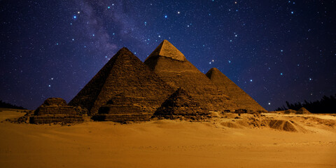 night scene of the castle pyramid in the desert