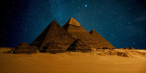 night scene of the castle pyramid in the desert