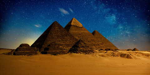 night scene of the castle pyramid in the desert