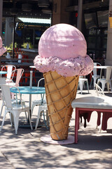 Big retro ice cream cone on patio