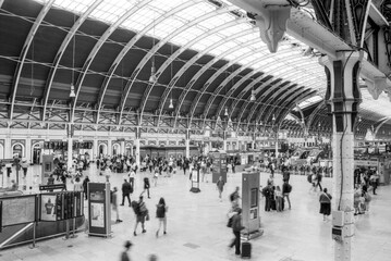 Passengers walking inside paddington station in london, united kingdom
