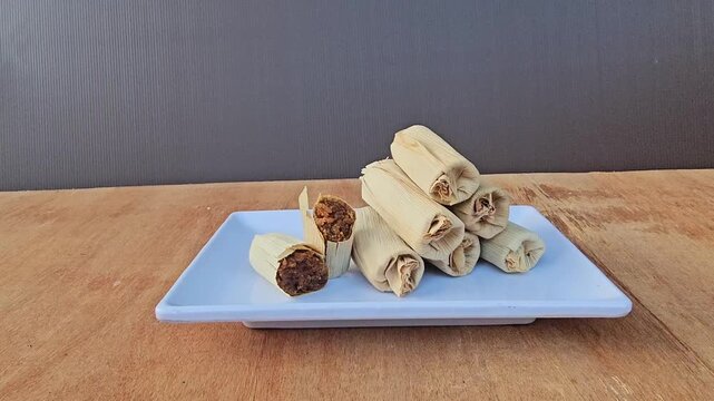 vanilla ice cream,Baje' or Bajek or Wajek is a authentic cake from Bugis ethnic and Mandar in Sulawesi,made from glutinous rice and palm sugar,wrapped in dried banana leaves.Baje' Buakayu 
