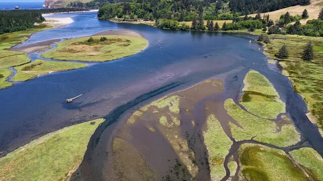 5 clips of Salmon River Estuary and Salmon River, heading downriver to Pacific Ocean and Cascade Head
