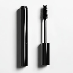 Obraz premium Black mascara tube and wand isolated on white background