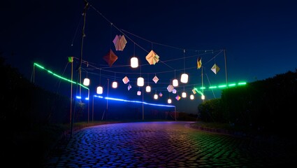 Magical Backyard Night Celebration with Handmade Paper Flowers and Twinkling Lights