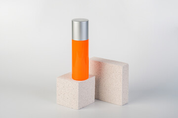 Skin care or sunscreen cosmetic with stylish props on white background.