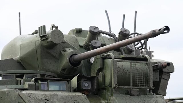 A close-up reveals the lethal weapon system of a Russian BMD-4M IFV. The 30mm autocannon, paired with advanced optics, gives it significant firepower in the Ukraine conflict.