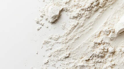 White flour powder scattered on a white background.