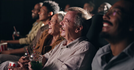 Funny, watching movie and people in cinema, entertainment and expression with humor, smile and...