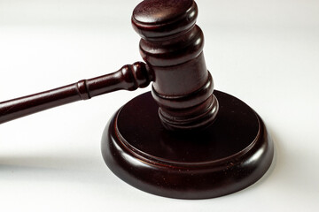wooden gavel on a wooden background