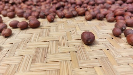 the process of drying coffee beans using traditional methods with sunlight to reduce the moisture...