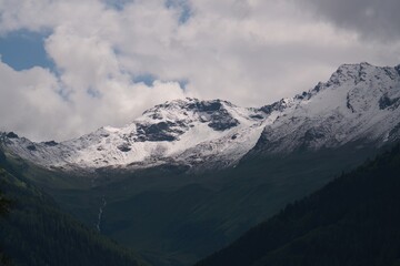 fresh snow on the alps at cold summer day