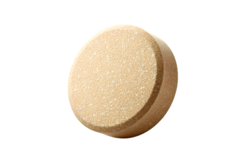 Beige chewable tablet with rough edges isolated on transparent background