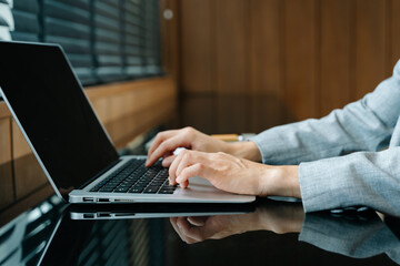 Businesswoman hand working digital marketing media in virtual screen with mobile phone and modern...