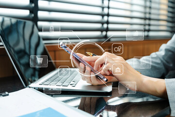 Digital marketing media social network, businesswoman using on smartphone and tablet as concept in...