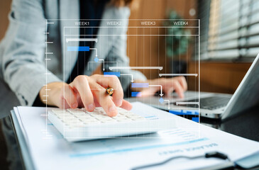 Project manager working and update tasks with milestones progress planning and Gantt chart...