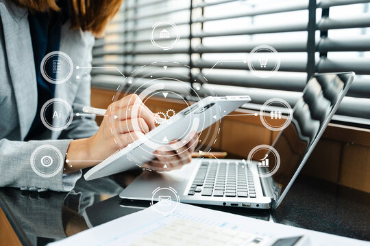 Businesswoman hand working digital marketing media in virtual screen with mobile phone and modern compute