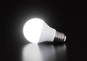 LED light bulb on black background, energy saving, idea concept