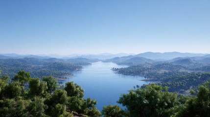 Scenic Lake View with Lush Green Trees and Mountainous Landscape on a Clear Day