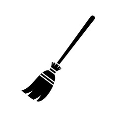A black silhouette of a witchs broomstick, isolated on a white background