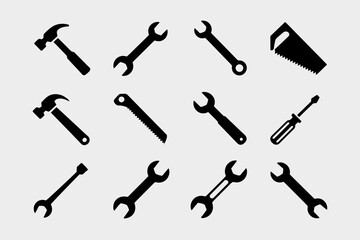 Naklejka premium Collection of black tool silhouettes including hammers wrenches saws and screwdrivers isolated on white background silhouette