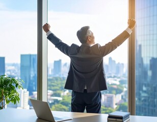 窓辺でリラックスするシニアビジネスマン