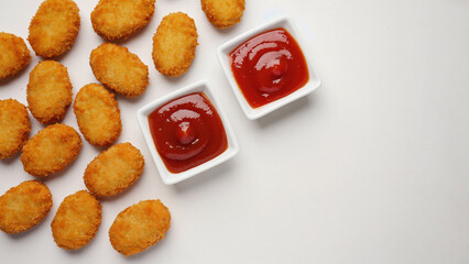 crispy chicken nuggets with sauce in a bowl.ai 