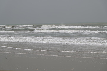 Murky waters of Rimini beach with overcast Sky, Rimini
