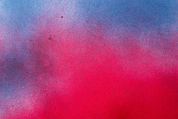 赤色と青色のスプレー塗料で塗った背景
